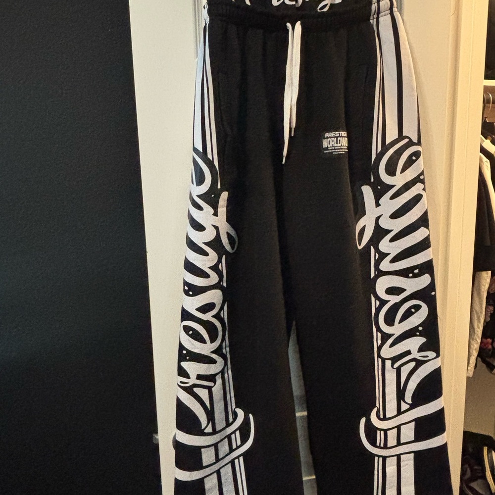 Black Graphic Mena Sweatpants with White Script Side Stripes